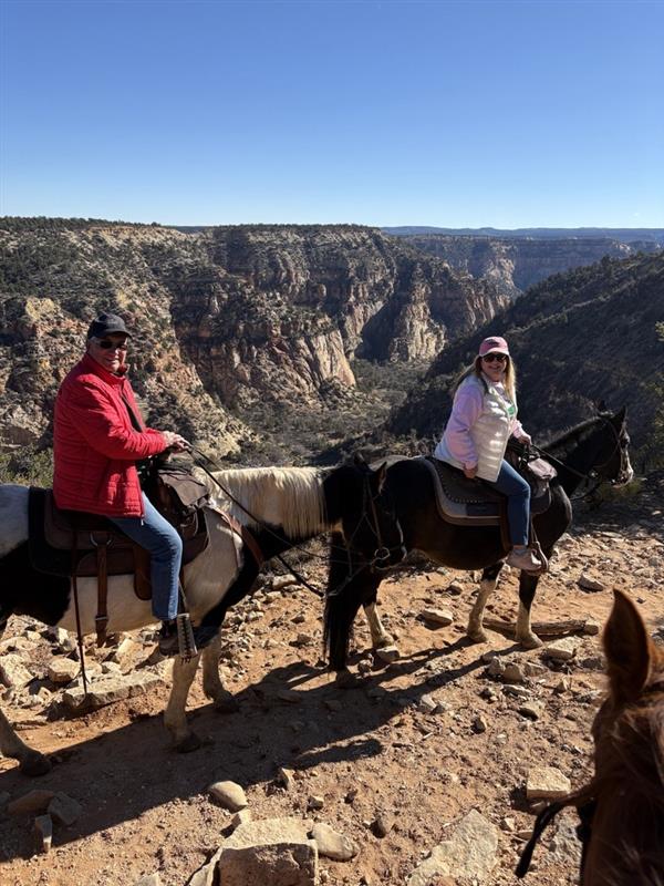 Debbie & Ron exploring via horseback in Utah!